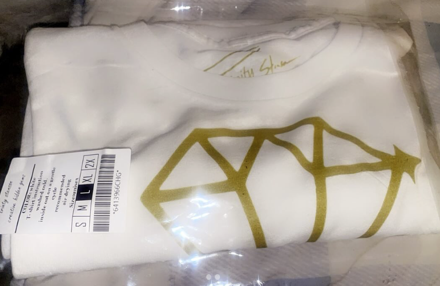 White Creative Hidden Gems T-Shirt Packaged